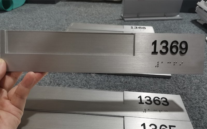  Applique & Raster Bead Braille Custom aluminum sign with window