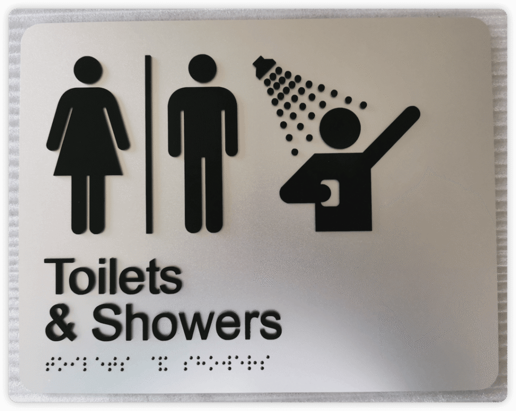 facilities for male and female with a dividing line signage in Australia