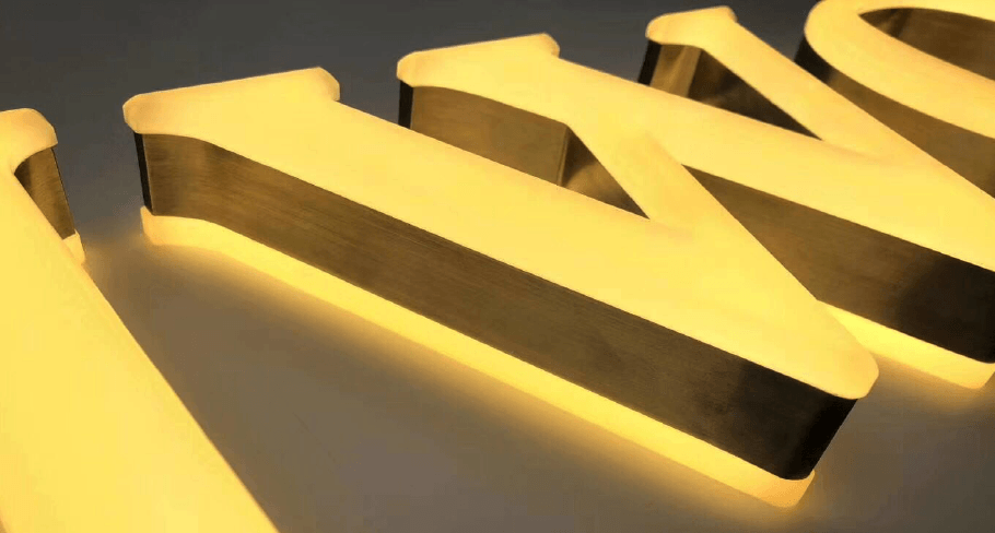 LED channel letters with warm white illumination designed to reduce pest attraction