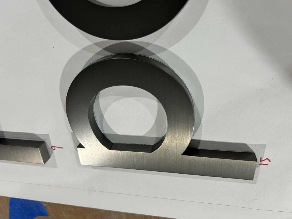 Non-Illuminated Fabricated Letters With Brushed Finish